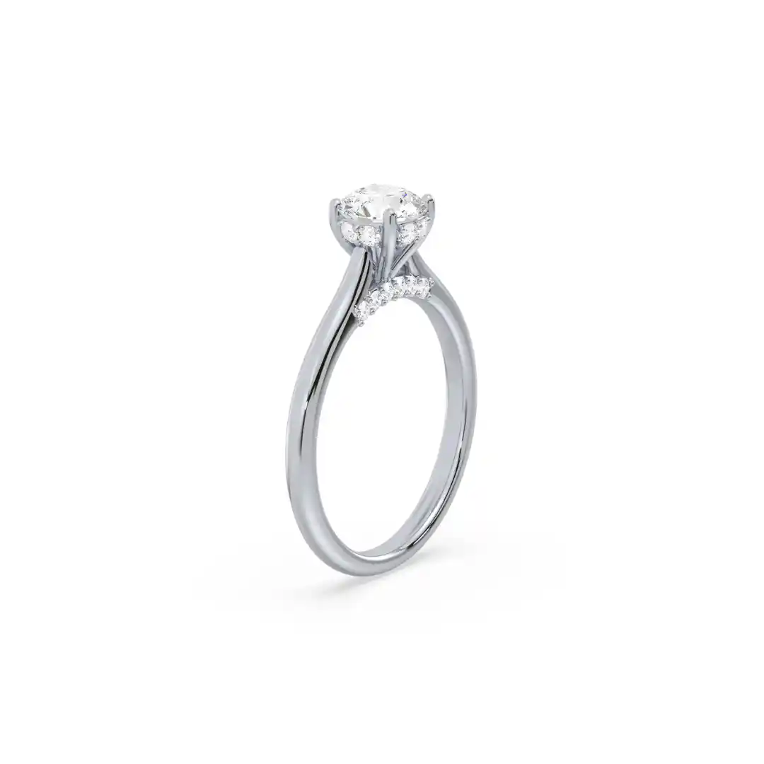 Classic Round Solitaire Secret Halo Engagement Ring Turned