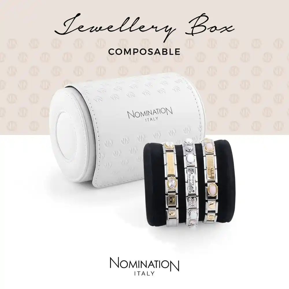 Three Nomination bracelets next to a Nomination jewellery box.