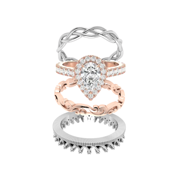 A bespoke 4 ring stack: Celtic platinum eternity band, pear-shaped lab-grown diamond engagement ring, rose gold vintage style infinity ring, and crown inner empress piece. Jewellery Designer - Jose, Benoni