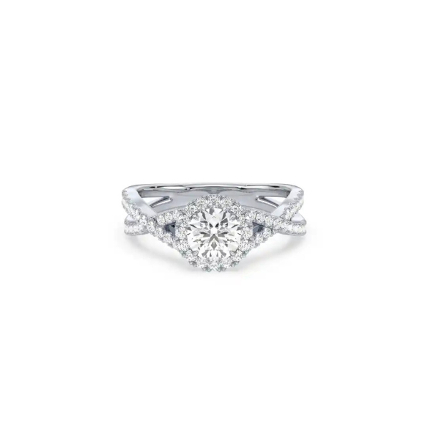 An infinity-inspired proposal ring in platinum or white gold. A classic addition to a wedding stack.