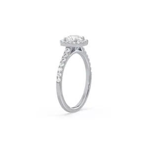 remodelled-engagement-ring-cushion-halo-design-josejewellers Elegant round cushion halo design ring with a pave diamond band.